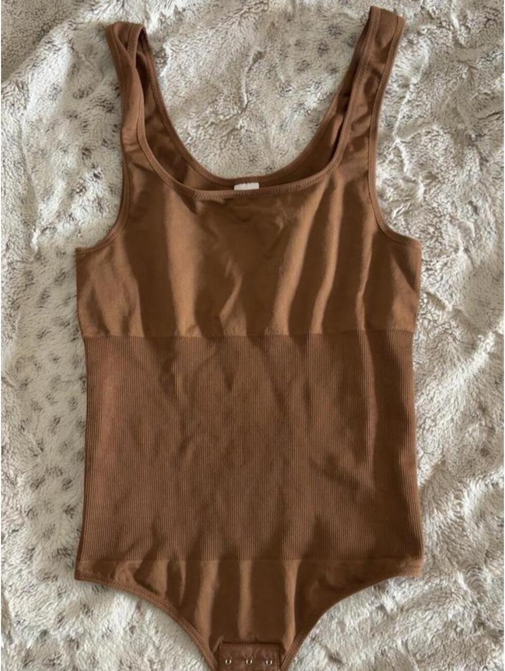warm brown bodysuit with ribbed texture
